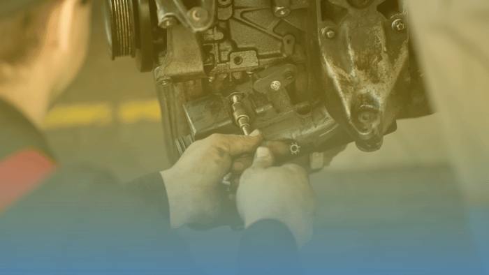 technician working on engine